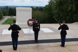 Men laugh at Tomb of the Unknown Soldier memorial, until camera catches soldier setting them straight